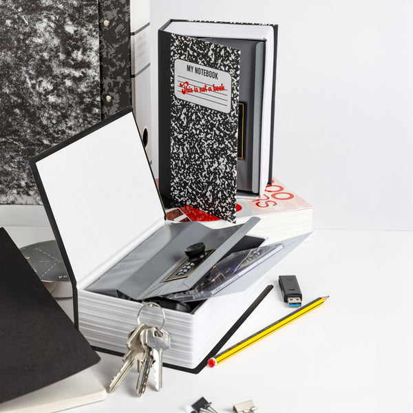 FISURA Cassaforte a forma di libro con scritta "This is not a book"