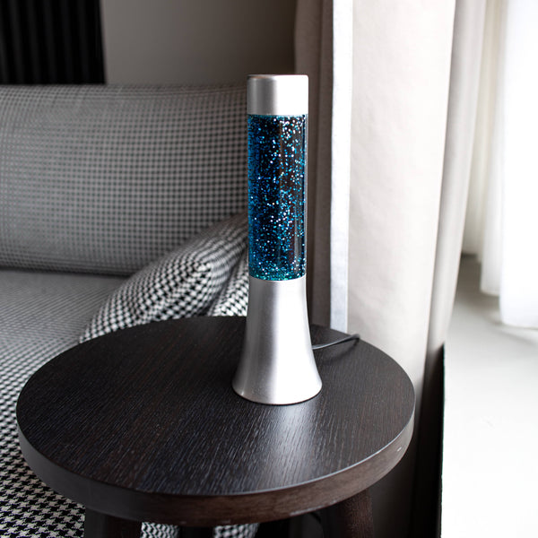 FISURA Lampada lava glitter da 30 cm con base argento e liquido blu